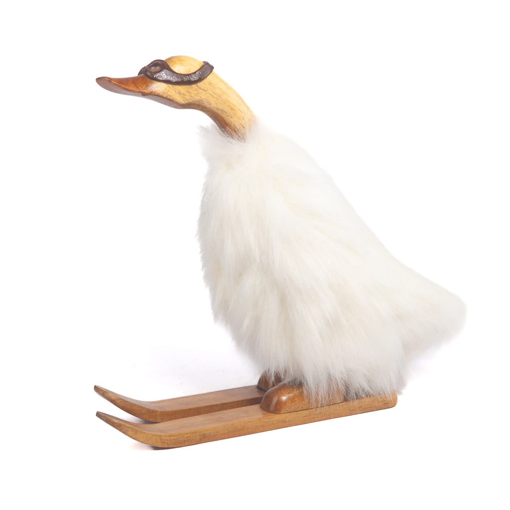 Houten eend - ski’s met bontjas