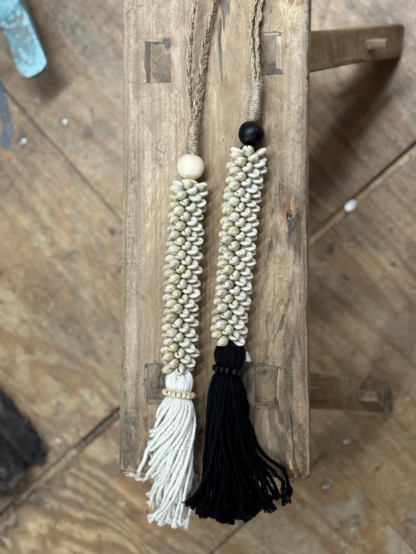 Long shell pendant with tassel and black wooden bead